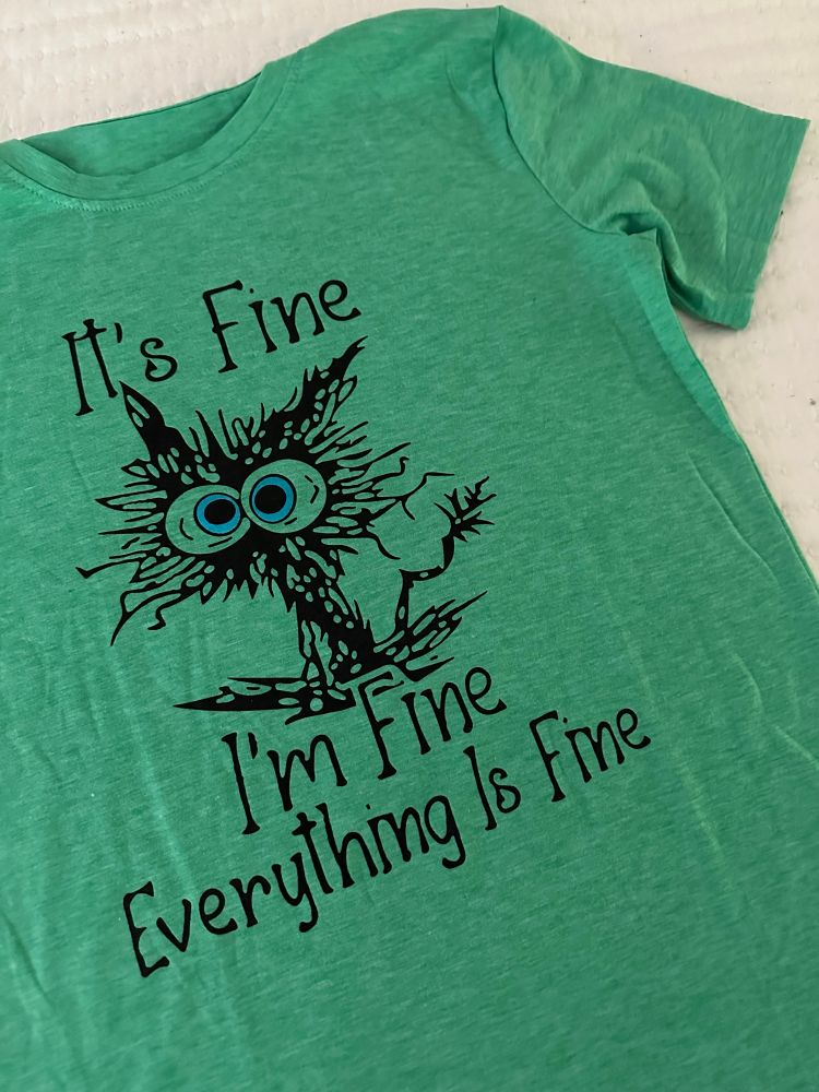 My kids got me a T-shirt of an extraordinarily frazzled cat surrounded by the words “it’s fine. I’m fine. Everything is fine.”