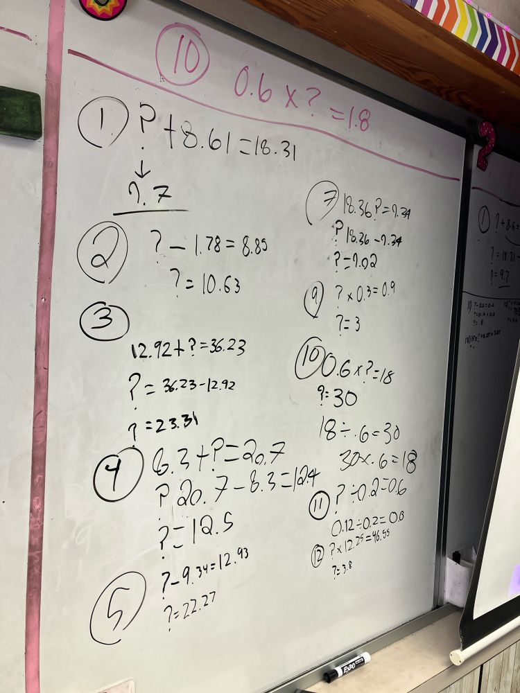 Whiteboard with a series of problems