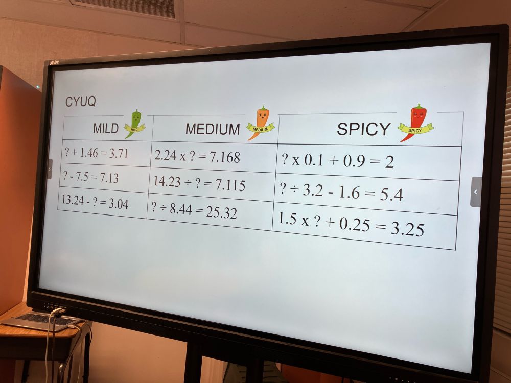 Screen with mild medium, and spicy problems to choose from for check your understanding