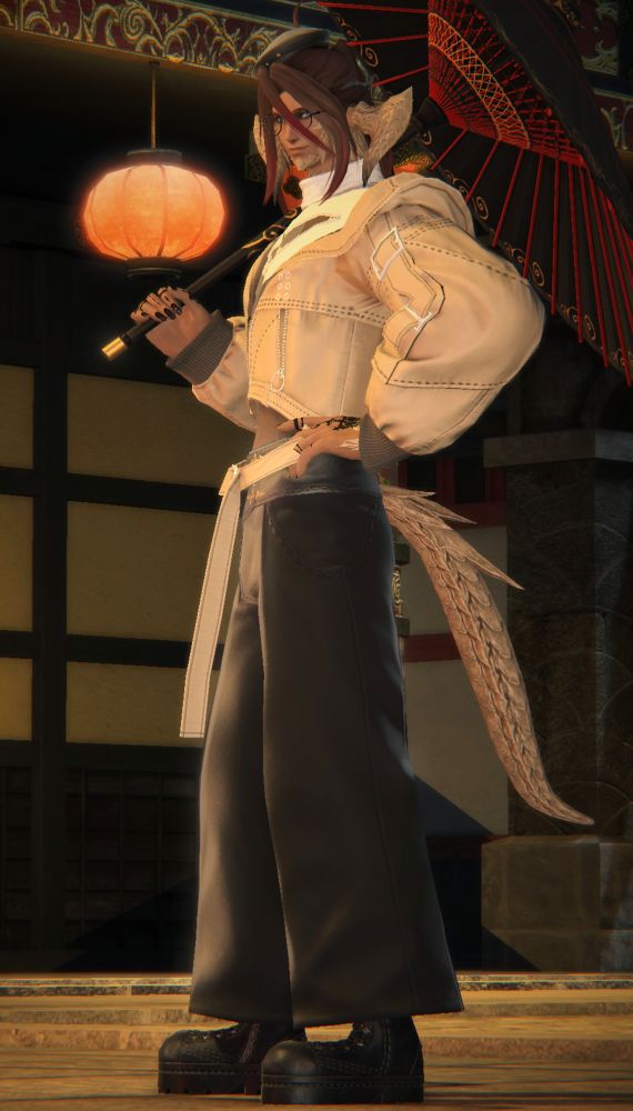 Picture of a Raen Au Ri man, holding a parasol and posing.