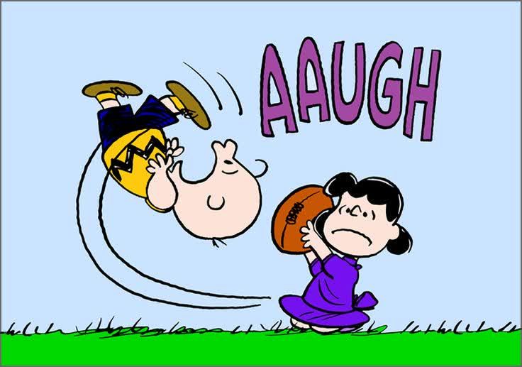 Lucy pulling football away from Charlie Brown's kick (again)