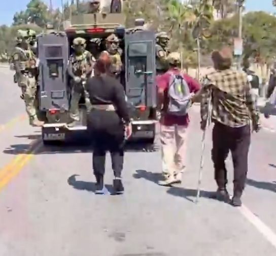 ICE gestapo getting heckled out of town by the neighborhood, including a guy chasing after them on one crutch 