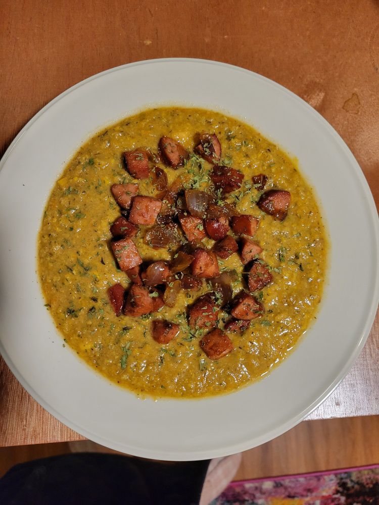 Corn chowder topped with parsley & fried polish turkey sausage sautéed with onions garlic and paprika