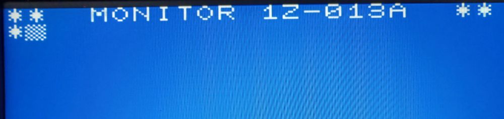 The Pico MZ emulator showing the boot screen. It is white text on a blue background and reads MONITOR 1Z-013A, followed by a flashing block cursor