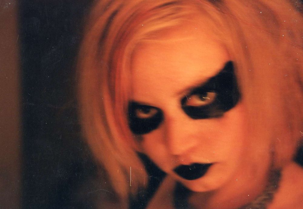 a nifty gothic shot of sparklefaerie after she took off a hand made metal mask for a nude shoot