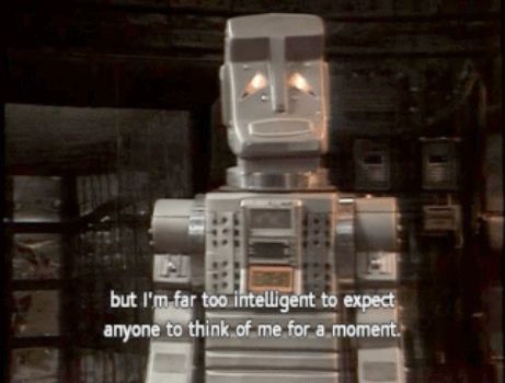 [Marvin] I suppose some people might expect better treatment after having waited 576,000 million years in a car park. But not me. I may just be a menial robot but I'm far too intelligent to expect anyone to think of me for a moment.