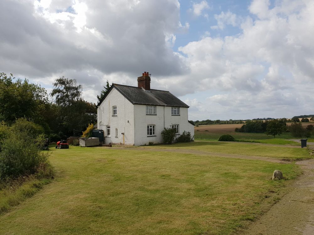 The house stood on a slight rise just on the edge of the village. It stood on its own and looked over a broad spread of West Country farmland. Not a remarkable house by any means – it was about thirty years old, squattish, squarish, made of brick, and had four windows set in the front of a size and proportion which more or less exactly failed to please the eye.

The only person for whom the house was in any way special was Arthur Dent, and that was only because it happened to be the one he lived in. He had lived in it for about three years, ever since he had moved out of London because it made him nervous and irritable. He was about thirty as well, dark haired and never quite at ease with himself. The thing that used to worry him most was the fact that people always used to ask him what he was looking so worried about. He worked in local radio which he always used to tell his friends was a lot more interesting than they probably thought. It was, too – most of his friends worked in advertising.