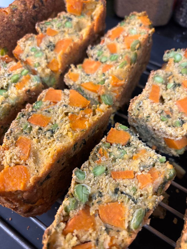Cornbread with edamame and sweet potato chunks (parrot food).