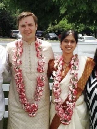 a picture of pre-sellout JD Vance and his wife Usha at a Hindi wedding ceremony.