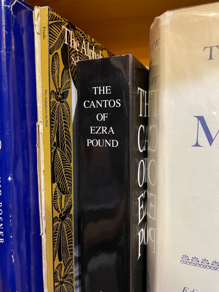 Spine of Ezra Pound’s Cantos. A black cover with capitalized white print