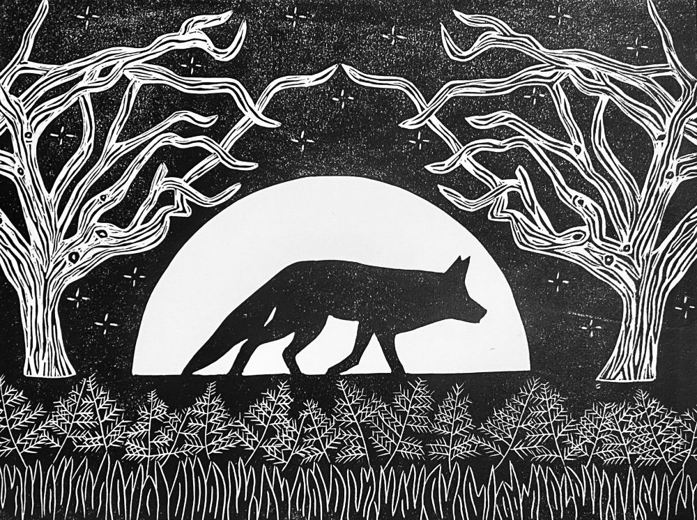 black and white lino print of a fox silhouetted in front of a rising moon. on either side are mirrored leafless trees; below is bracken and grass