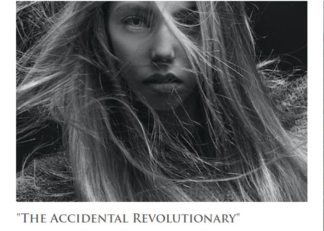 A young girl stands facing us, her face is serious. Her long hair is blowing in the wind. Caption says, 'The Accidental Revolutionary.'