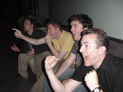 meme of 4 white guys cheering on a sofa