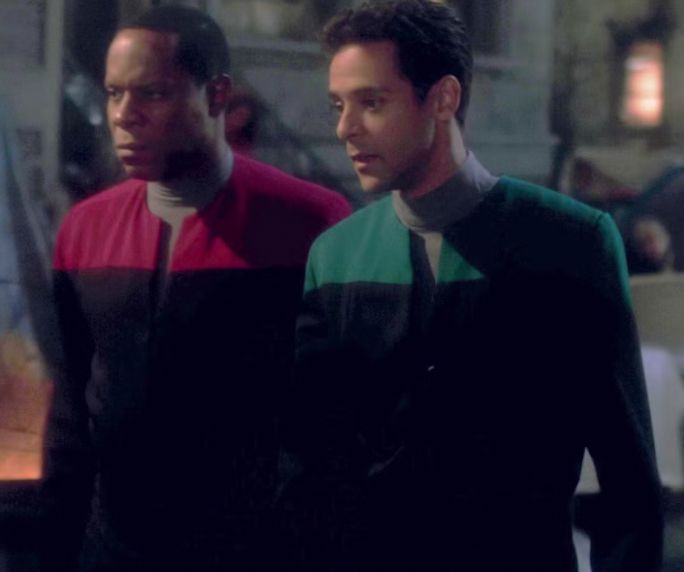 Deep Space 9 uniforms. They're mostly black with a stripe of blue and red accenting them.
