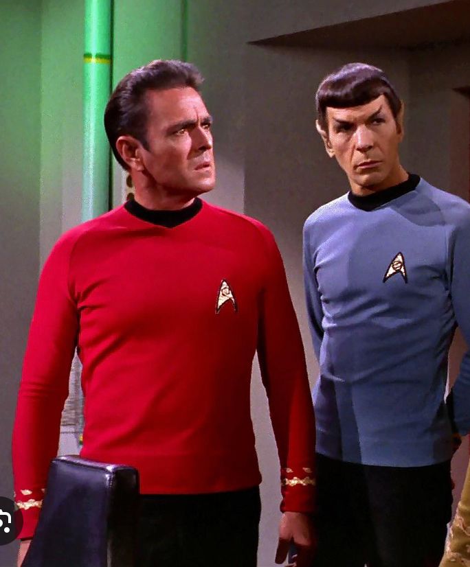 Star Trek TOS uniforms. They're red and blue shirts accented by black pants and undershirts.