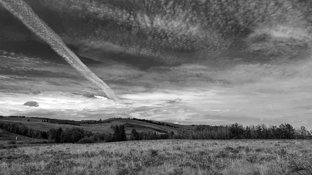 Looking north to the treed foothills against a spectacular sky.