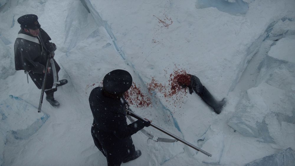 Fitzjames stares at Sir John's severed leg in the snow.