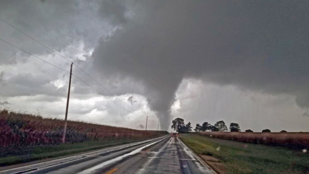 Cone tornado viewed from less than a mile away 