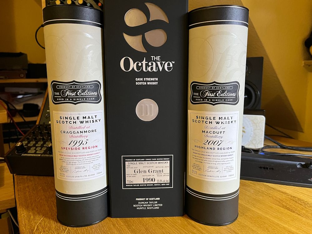 Three bottles of whisky: 15 year old Macduff, 26 year old Cragganmore and a 30 year old Glen Grant.