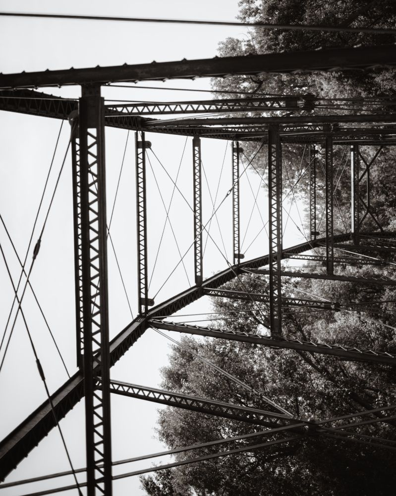A sideway view of the top of a bridge.