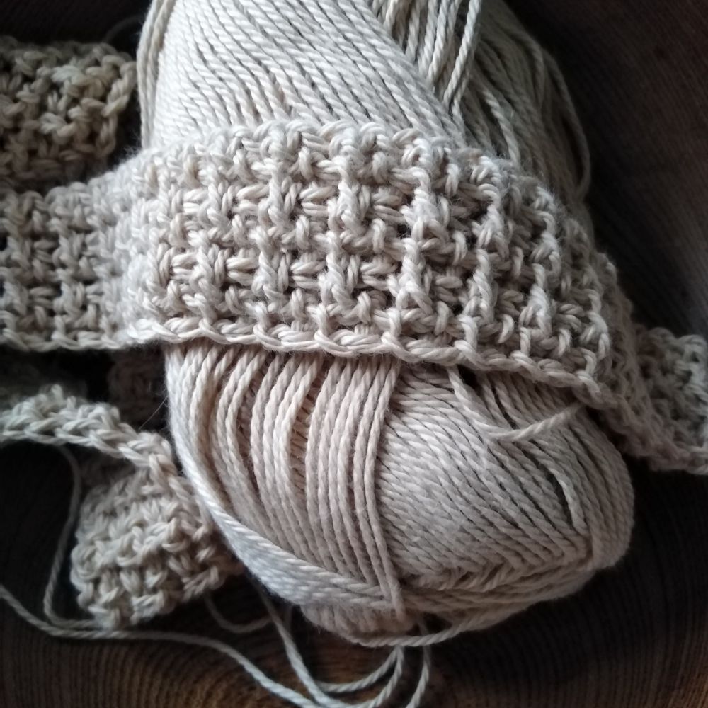 Off white yarn with band of waffle stitch crochet