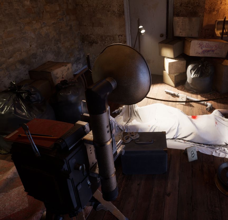 A game art environment of a homicide scene, with a view of a victim under a white blood-stained tarp in the background, a mid 20th century camera in the foreground, and the murder weapon highlighted by a portable spot-light in the background adjacent the victim. Boxes, trash bags, and other set-dressing props are scattered in the background, including a red notepad with pencil atop the camera, a grungy and tilted basin sink in the background. There are also number tent cards next to points of interest (ex. the body, weapon, etc.)