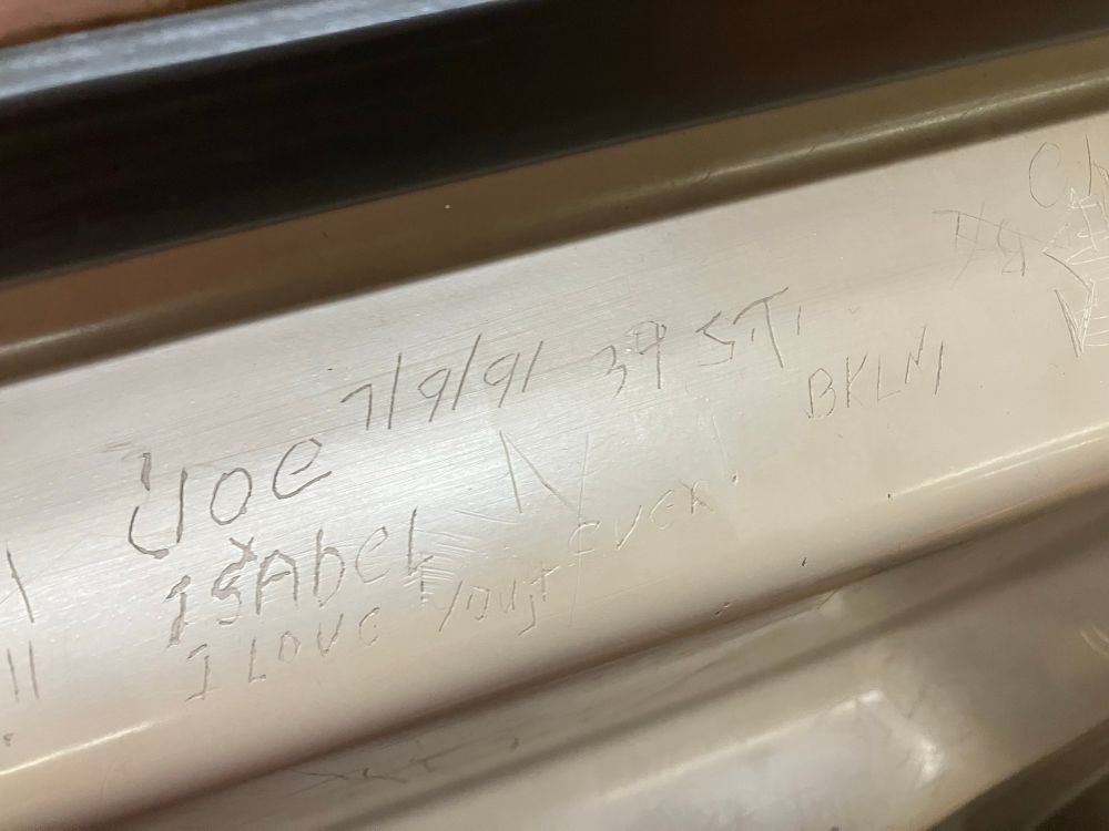 Joe and Isabel love scratching on subway car 