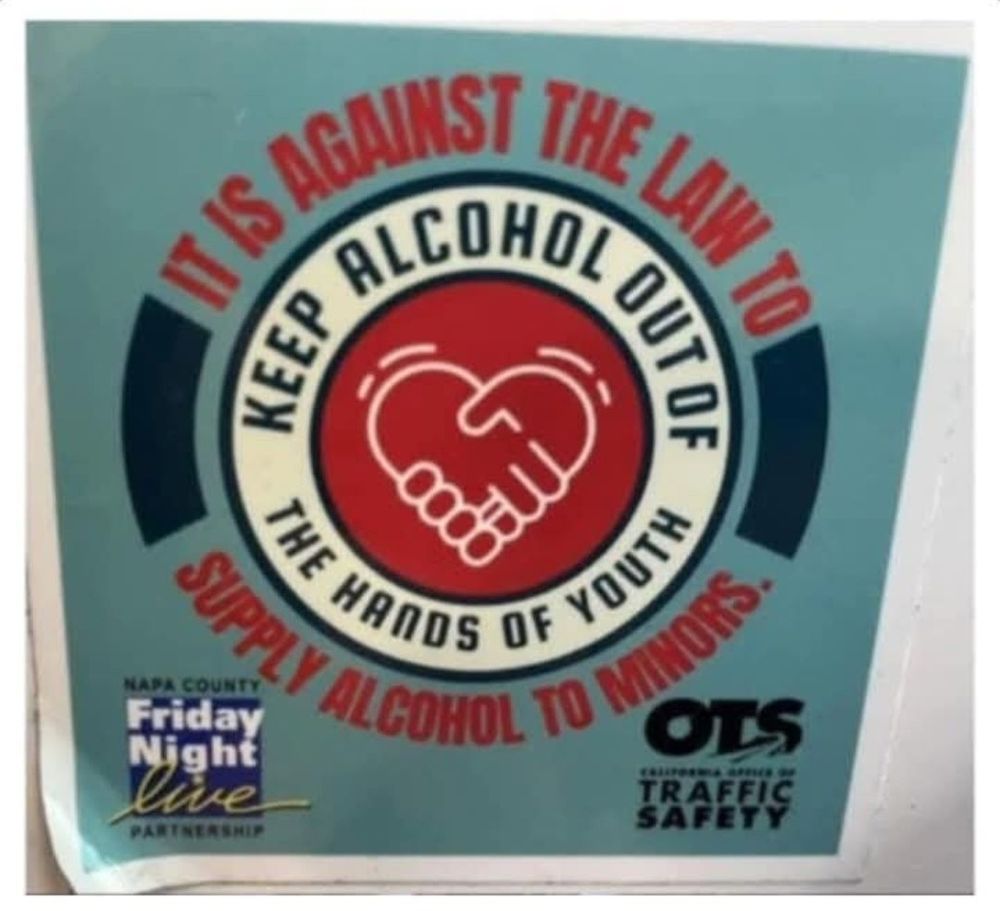 Anti youth drinking sign that due to "South Mouth syndrome" looks like it says "It's against the law to keep alcohol out of the hands of youth. Supply alcohol to minors."