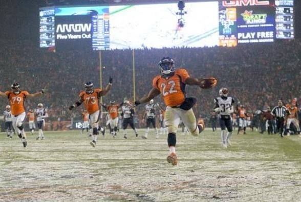CJ Anderson celebrating a 48 yard touchdown to win the Broncos - Pats 2015 matchup 