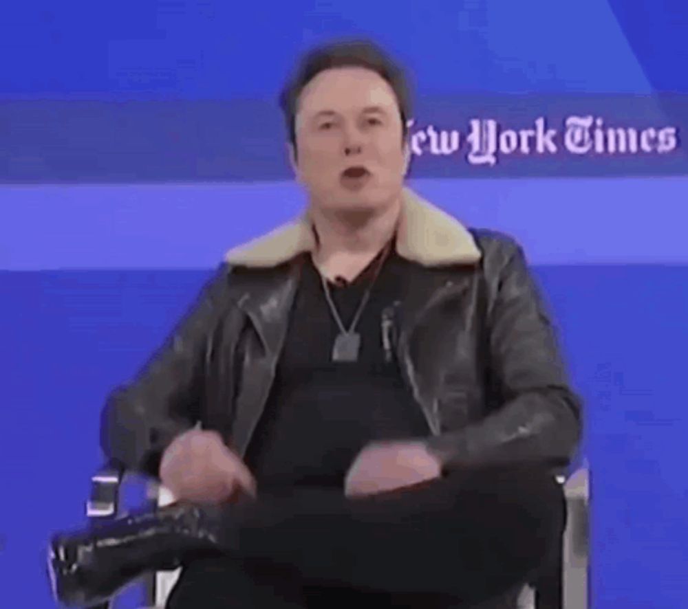 elon musk is giving the middle finger while wearing a black leather jacket .