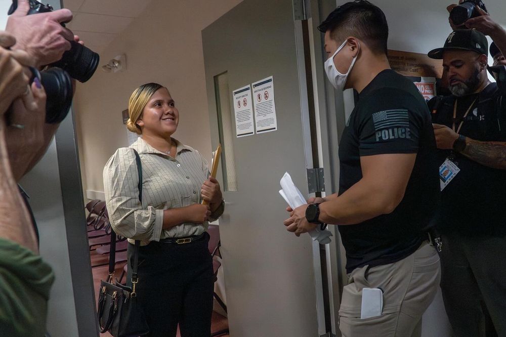 She walked out of her immigration hearing smiling — clutching her papers, standing tall, hopeful. She had no idea the man approaching her in the hallway was ICE. No idea she was about to be detained.
...
