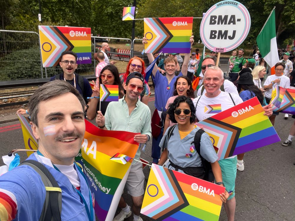 The BMA/BMJ crew with placard and a huge banner, waiting on Park Lane to begin the March
