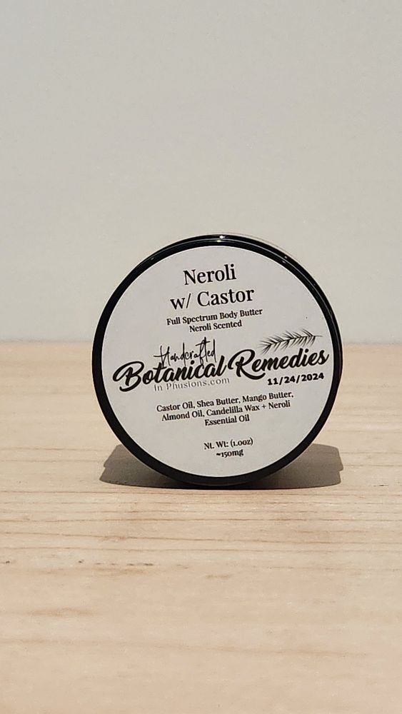 A round, 2 ounce, container of body butter labeled "Neroli w/ Castor." It is identified as a full-spectrum body butter with a neroli scent. The ingredients include castor oil, shea butter, mango butter, almond oil, candelilla wax, and essential oil.