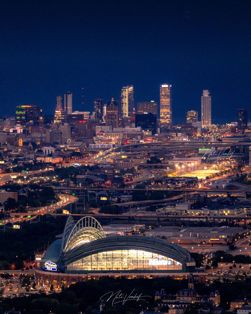 drone photo showing miller park and the milwaukee skyline 