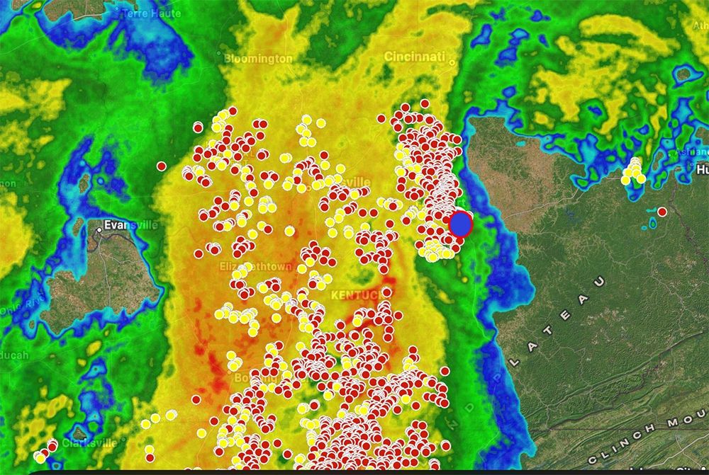 Map of lightning strikes in the Bluegrass last night. Dark blue dot is Lexington. Red dots are recent strikes, yellow dots are older. Strikes are overlaid on a radar map. Source: My Lightning Tracker app