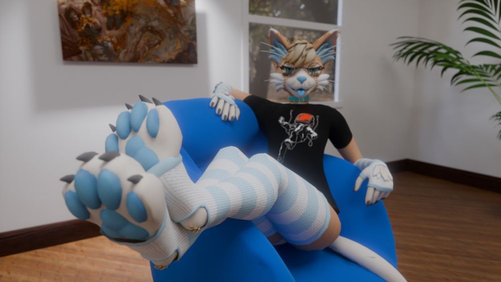 Ceemyk (my cat fursona) wearing light blue and white striped thigh highs, putting his paws up close to the camera, he's sitting back on a blue armchair, "Margaritas" by Jonathan Vair Duncan hangs in the background.