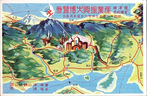 Mountains and lakes in 3D with red routes drawing over the top. There is a small town and a tiny train 