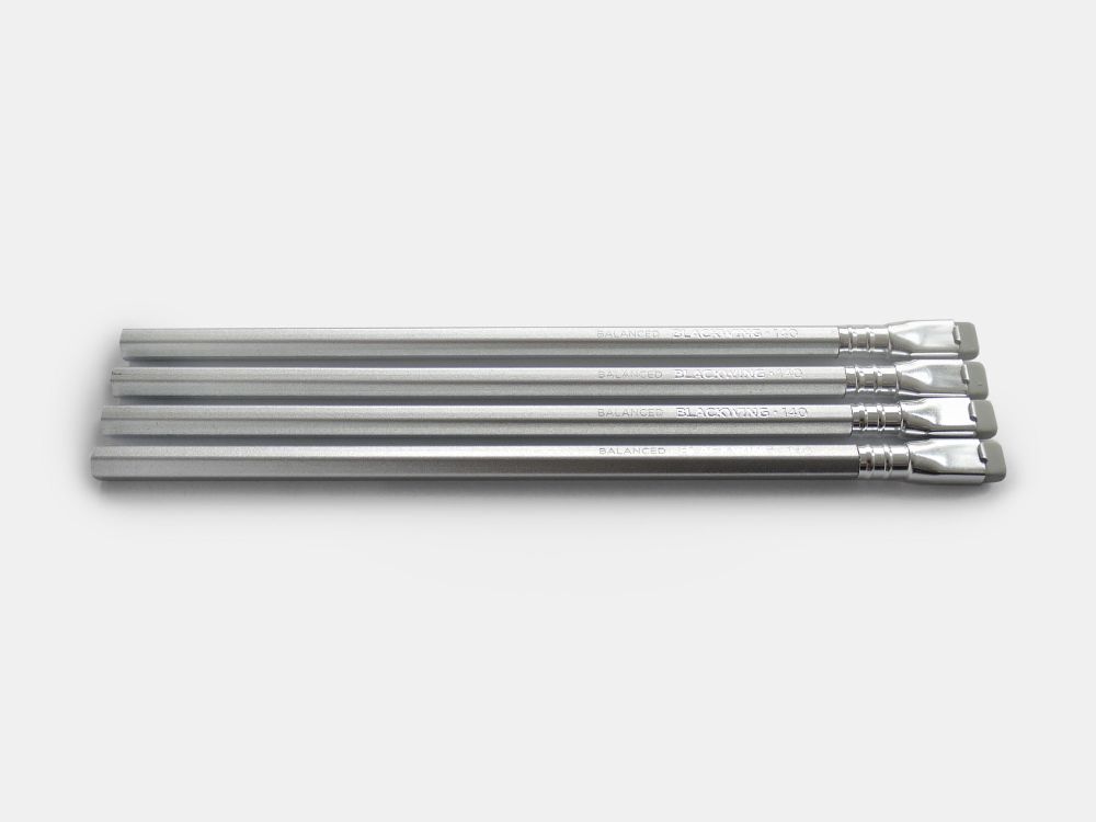 A row of 4 pencils. They are all matt silver, with a silver ferrule, eraser holder and pale grey eraser.