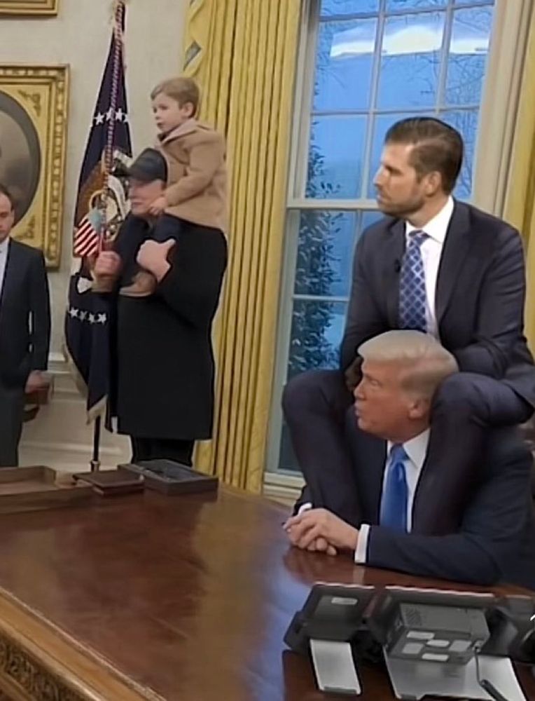 Elon Musk with child on his shoulders. Donoald Trump with JD Vance sitting on his shoulders 