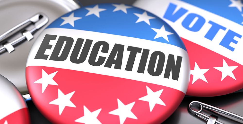 Red, white, and blue button with stars and stripes, featuring the word "EDUCATION" prominently, alongside another button reading "VOTE".
