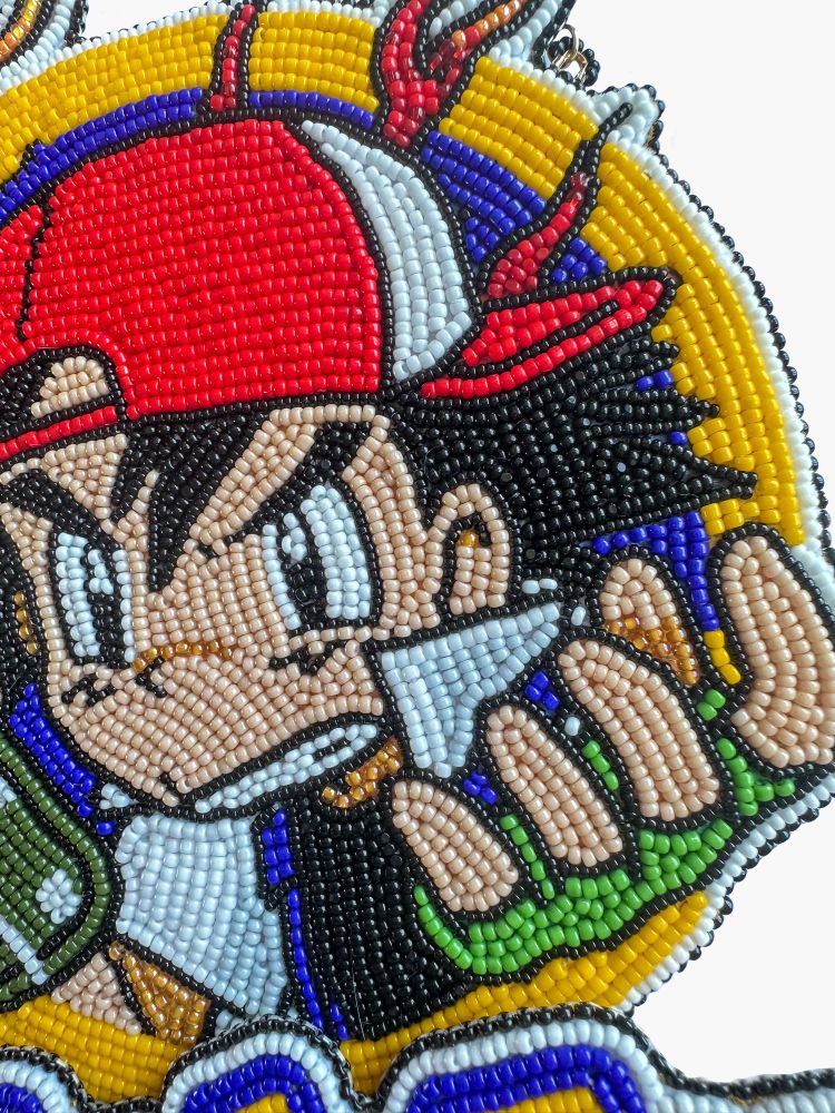 details of a large wall hanging beaded art piece of ash ketchum from pokemon holding a molotov cocktail, with fuck ice text on a secondary layer 