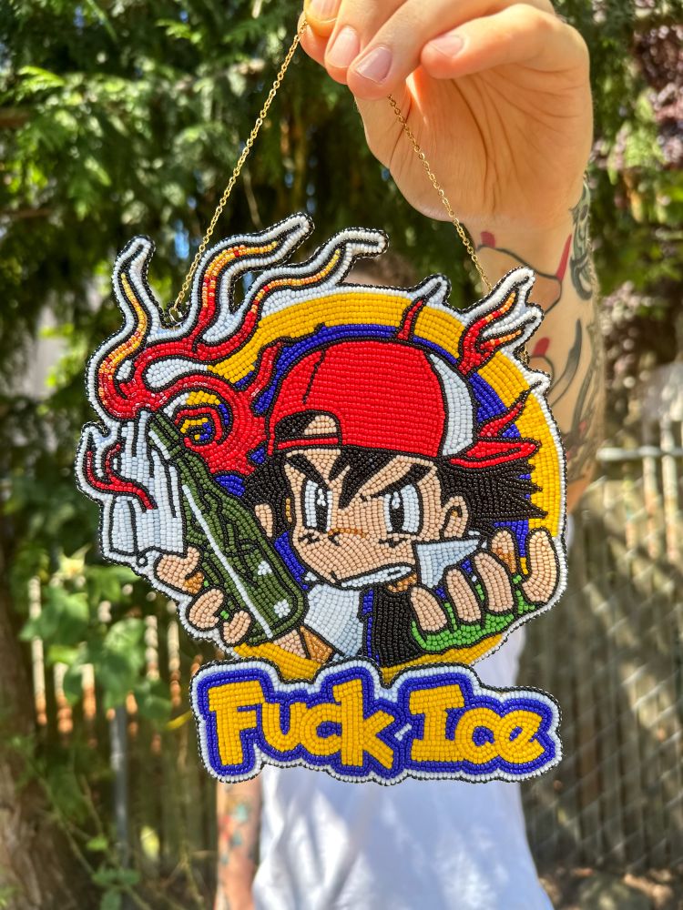  a native american beaded art piece of ash ketchum with a molotov cocktail that reads fuck ice 