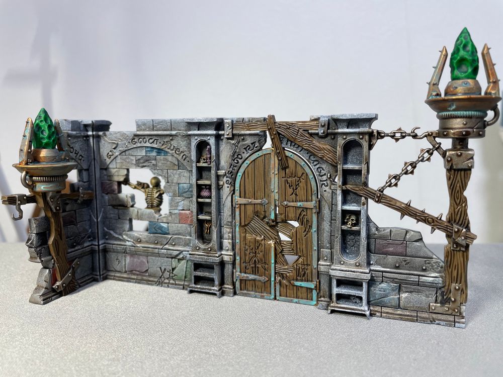 Painted miniature ruins from the Age of Sigmar Spearhead game