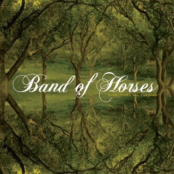 The album cover for EVERYTHING ALL THE TIME by Band Of Horses. It’s a forest with its on reflection . 
