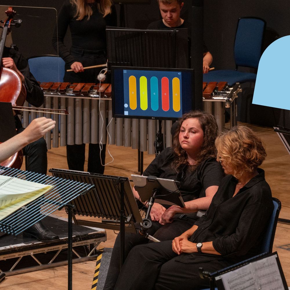 A young musician plays the Clarion accessible instrument on stage.