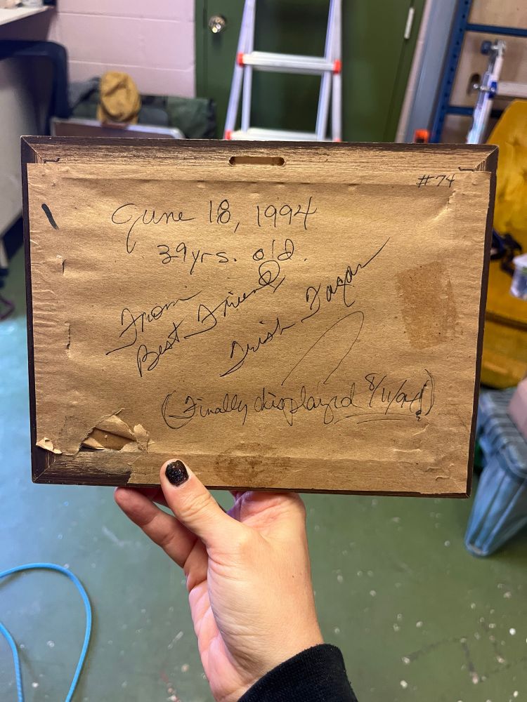 The paper on the back of the frame says:
“June 18, 1994. 
39 years old.
From best friend, Trish Fagan
(Finally displayed August 11, 1994)”