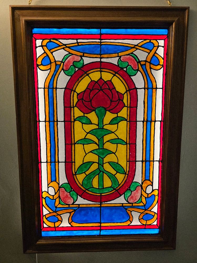 Stained glass panel depicting a rose