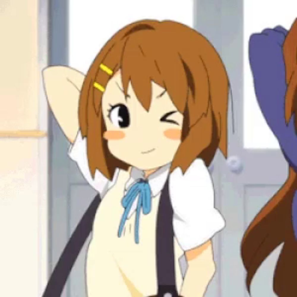 a cartoon girl with brown hair and a blue bow tie winks at the camera