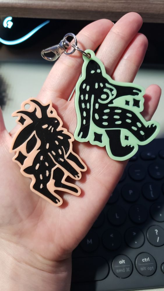 Bigfoot and jackelope glow in the dark keychains