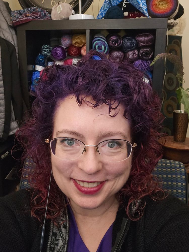 Selfie with fresh hair dye, purple front fading to red in the back